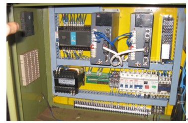 AS100交流伺服系统在数控割料机上的应用